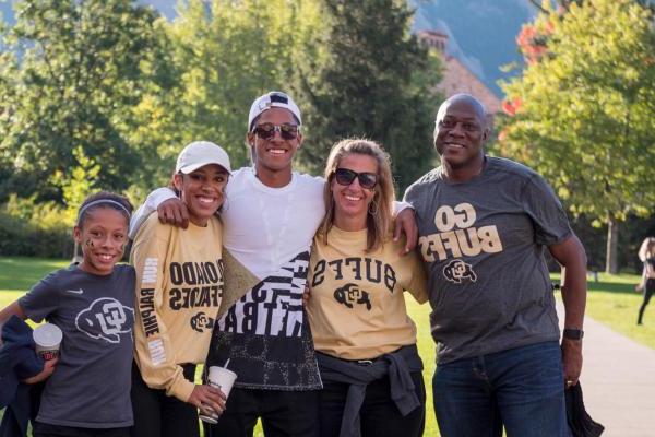 A multi-generational family in CU Boulder gear